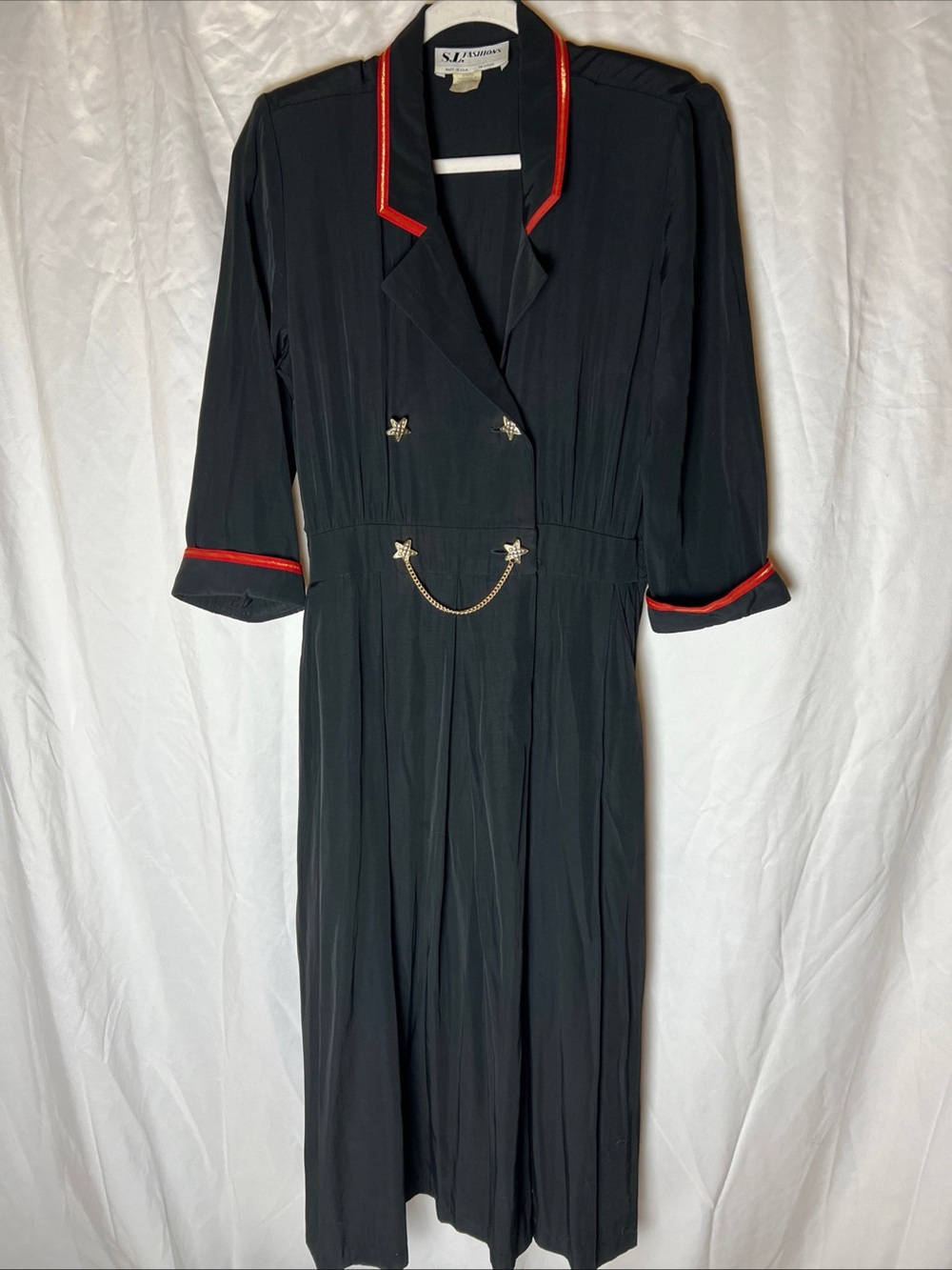 S.L. Fashions Black Midi Dress with Red Trim and Star Chain